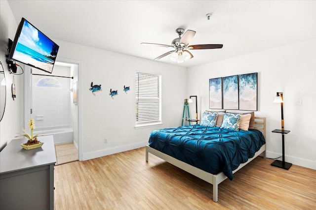 926 Whelk Ct Unit C, Fort Walton Beach, FL 32548 - bedroom with light wood finished floors, connected bathroom, and ceiling fan
