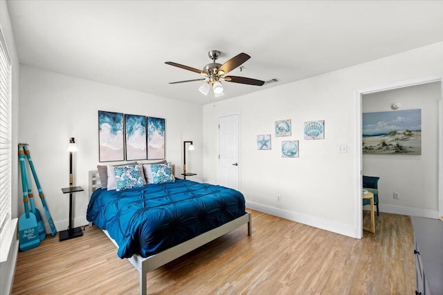 926 Whelk Ct Unit C, Fort Walton Beach, FL 32548 - bedroom featuring light wood finished floors and a ceiling fan