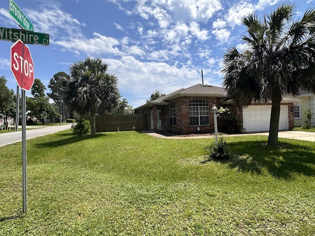 1174 Witshire Ct, Fort Walton Beach, FL 32547 - view of yard featuring driveway and an attached garage