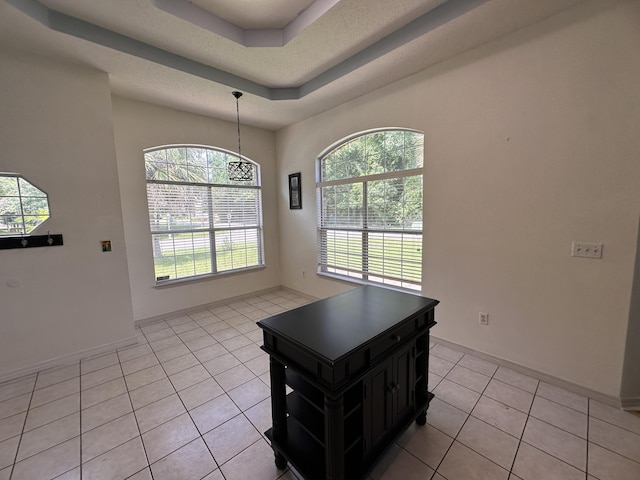 1174 Witshire Ct, Fort Walton Beach, FL 32547 - dining area featuring light tile patterned flooring and a tray ceiling