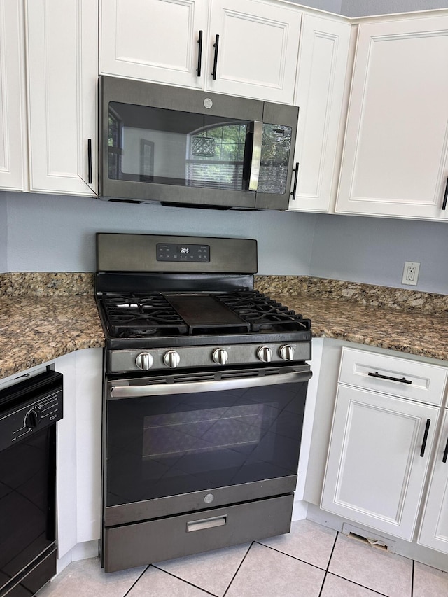 1174 Witshire Ct, Fort Walton Beach, FL 32547 - kitchen with range with gas cooktop, black dishwasher, and white cabinetry