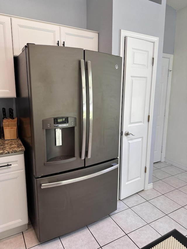 1174 Witshire Ct, Fort Walton Beach, FL 32547 - kitchen featuring stainless steel fridge, white cabinetry, and light tile patterned floors