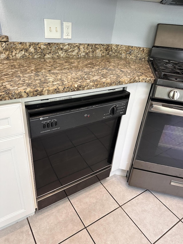 1174 Witshire Ct, Fort Walton Beach, FL 32547 - kitchen view of dishwasher, stainless steel gas stove, white cabinets, and dark stone countertops