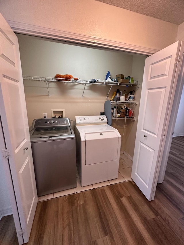1174 Witshire Ct, Fort Walton Beach, FL 32547 - laundry area featuring washer and clothes dryer and wood finished floors