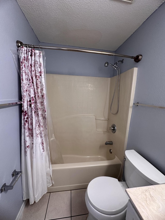 1174 Witshire Ct, Fort Walton Beach, FL 32547 - full bathroom with a textured ceiling, shower / bathtub combination with curtain, vanity, and tile patterned flooring