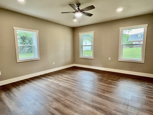 16 N 1st St, Defuniak Springs, FL 32433 - spare room with plenty of natural light, dark wood finished floors, ceiling fan, and recessed lighting