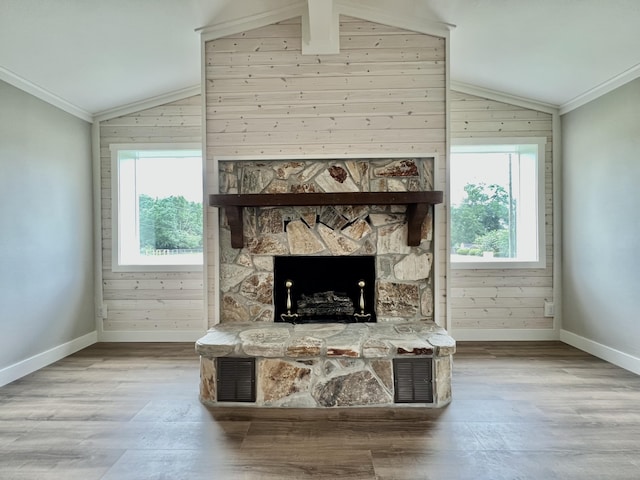 16 N 1st St, Defuniak Springs, FL 32433 - detailed view of wooden walls, wood finished floors, crown molding, and a fireplace