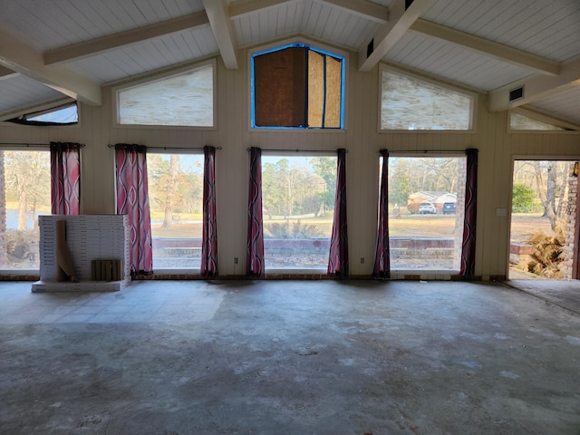 5131 Wiggins Lake Rd, Walnut Hill, FL 32568 - unfurnished living room featuring unfinished concrete flooring and wood walls