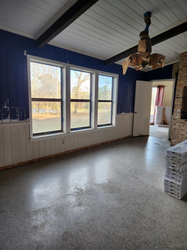 5131 Wiggins Lake Rd, Walnut Hill, FL 32568 - empty room with beamed ceiling