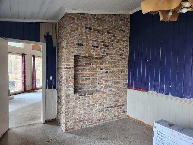 5131 Wiggins Lake Rd, Walnut Hill, FL 32568 - carpeted spare room with wood walls, crown molding, wainscoting, ceiling fan, and wood ceiling