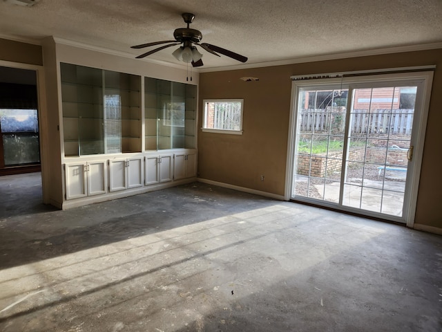 5131 Wiggins Lake Rd, Walnut Hill, FL 32568 - empty room with crown molding, a ceiling fan, and a textured ceiling