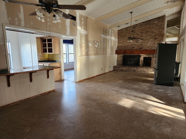 5131 Wiggins Lake Rd, Walnut Hill, FL 32568 - unfurnished living room featuring a ceiling fan, a brick fireplace, high vaulted ceiling, a wainscoted wall, and a wood ceiling with exposed beams