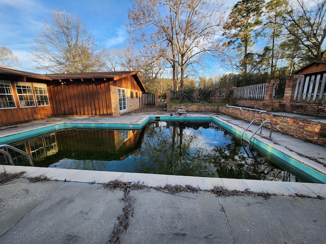 5131 Wiggins Lake Rd, Walnut Hill, FL 32568 - view of swimming pool with a fenced backyard