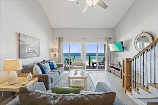 3290 Scenic Highway 98 Unit 305B, Destin, FL 32541 - living room with wood finished floors, lofted ceiling, a ceiling fan, and stairway