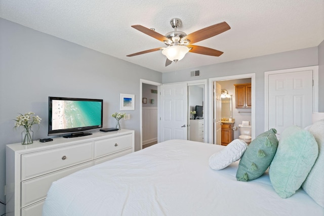 3290 Scenic Highway 98 Unit 305B, Destin, FL 32541 - bedroom with a ceiling fan and ensuite bathroom