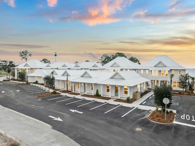 246 Dockside Dr, Port St Joe, FL 32456 - property at dusk featuring uncovered parking and a residential view