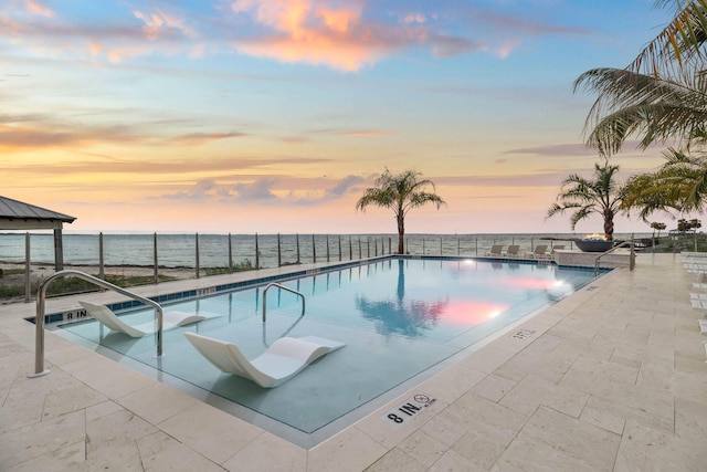 246 Dockside Dr, Port St Joe, FL 32456 - pool at dusk with a community pool and a patio area
