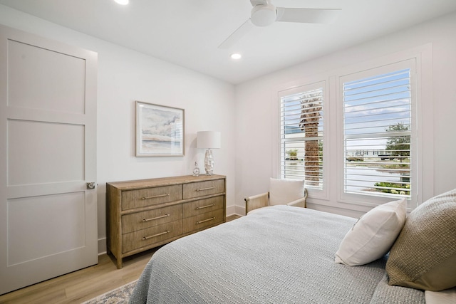 246 Dockside Dr, Port St Joe, FL 32456 - bedroom with light wood-style floors, recessed lighting, and ceiling fan