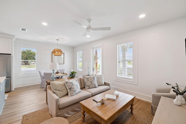 246 Dockside Dr, Port St Joe, FL 32456 - living area with healthy amount of natural light, recessed lighting, light wood finished floors, and ceiling fan
