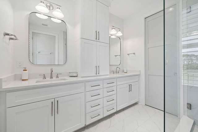 246 Dockside Dr, Port St Joe, FL 32456 - bathroom featuring marble finish flooring, double vanity, and a shower stall