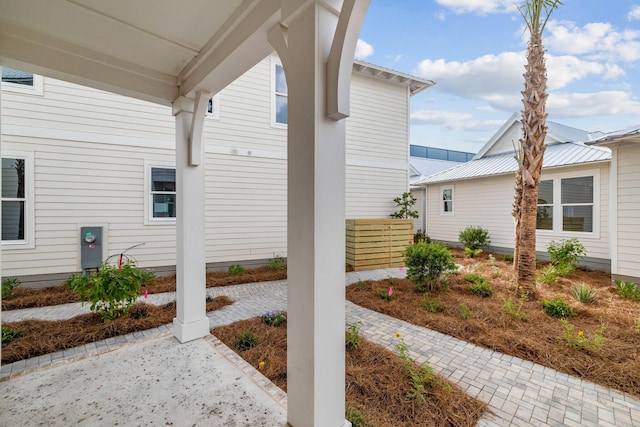 246 Dockside Dr, Port St Joe, FL 32456 - view of home's exterior with a metal roof
