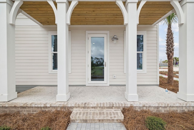 246 Dockside Dr, Port St Joe, FL 32456 - doorway to property with a porch