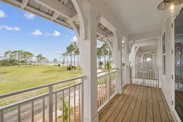 246 Dockside Dr, Port St Joe, FL 32456 - deck with a water view and a lawn