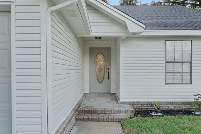 136 Oak Terrace Dr, Crestview, FL 32539 - view of exterior entry with a shingled roof
