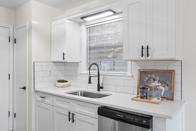 136 Oak Terrace Dr, Crestview, FL 32539 - kitchen featuring dishwasher, white cabinetry, backsplash, and light countertops