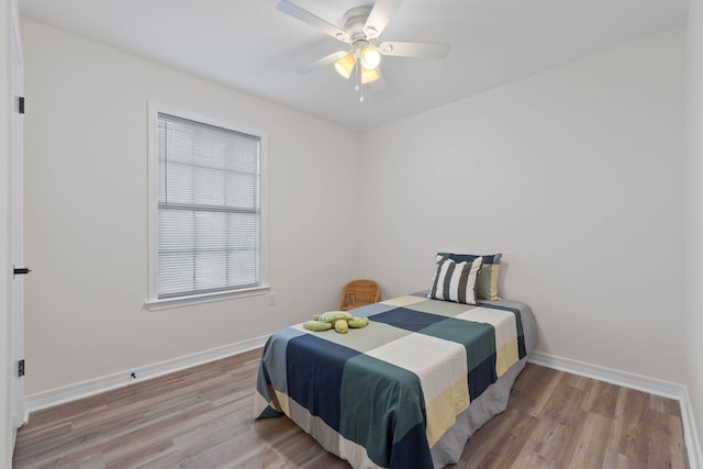 136 Oak Terrace Dr, Crestview, FL 32539 - bedroom with wood finished floors and ceiling fan
