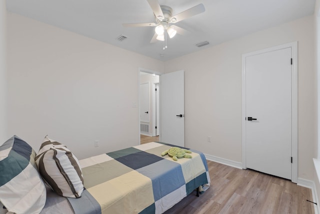136 Oak Terrace Dr, Crestview, FL 32539 - bedroom with light wood-style floors and ceiling fan