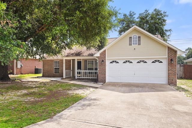 4601 Top Flight Dr, Crestview, FL 32539 - ranch-style house featuring brick siding, concrete driveway, an attached garage, and covered porch
