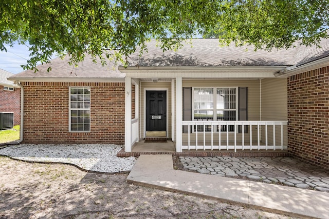 4601 Top Flight Dr, Crestview, FL 32539 - entrance to property with brick siding, covered porch, and roof with shingles