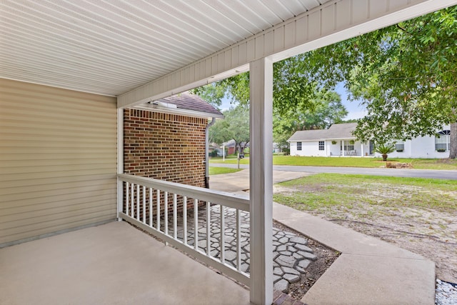 4601 Top Flight Dr, Crestview, FL 32539 - covered porch featuring a yard