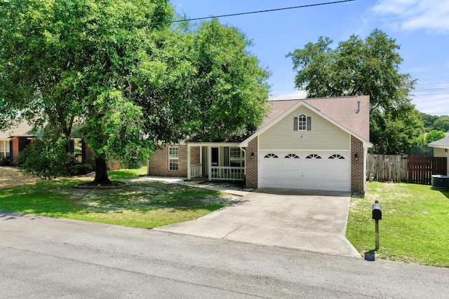 4601 Top Flight Dr, Crestview, FL 32539 - view of front of home featuring brick siding, a garage, driveway, and covered porch