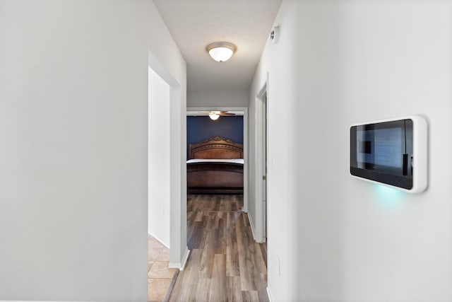 4601 Top Flight Dr, Crestview, FL 32539 - corridor with wood finished floors and baseboards