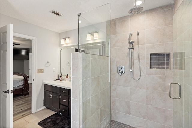 4601 Top Flight Dr, Crestview, FL 32539 - full bathroom featuring connected bathroom, a stall shower, and vanity