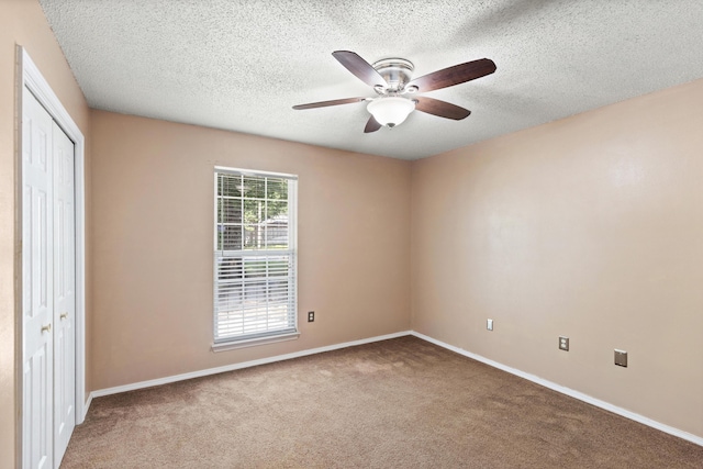 4601 Top Flight Dr, Crestview, FL 32539 - carpeted empty room with a ceiling fan and a textured ceiling