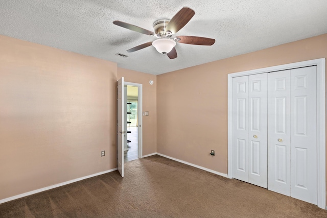 4601 Top Flight Dr, Crestview, FL 32539 - unfurnished bedroom with carpet flooring, a closet, a textured ceiling, and ceiling fan