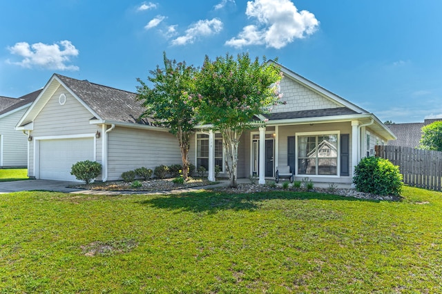 138 Crab Apple Ave, Crestview, FL 32536 - view of front of home with an attached garage, a porch, and driveway