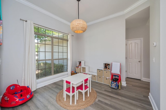 138 Crab Apple Ave, Crestview, FL 32536 - rec room with crown molding and wood finished floors