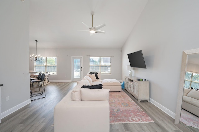 138 Crab Apple Ave, Crestview, FL 32536 - living room with light wood-style floors, a chandelier, ceiling fan, and high vaulted ceiling