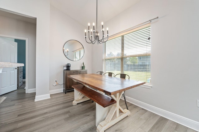 138 Crab Apple Ave, Crestview, FL 32536 - dining area featuring light wood finished floors and a chandelier