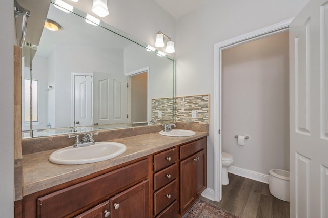 138 Crab Apple Ave, Crestview, FL 32536 - bathroom with double vanity and wood finished floors
