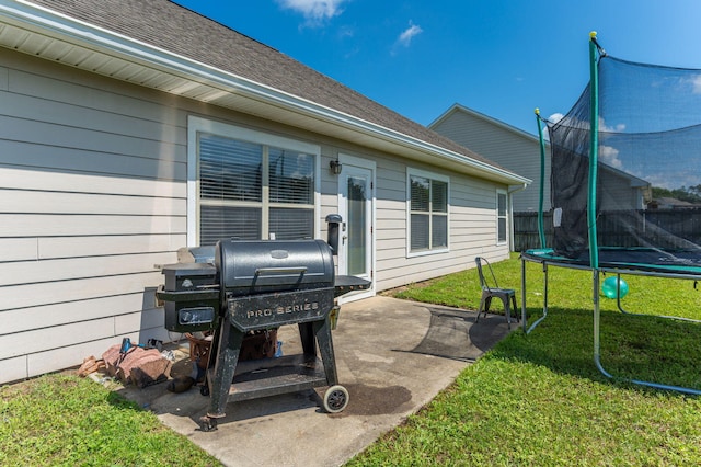 138 Crab Apple Ave, Crestview, FL 32536 - view of patio / terrace with a trampoline and a grill