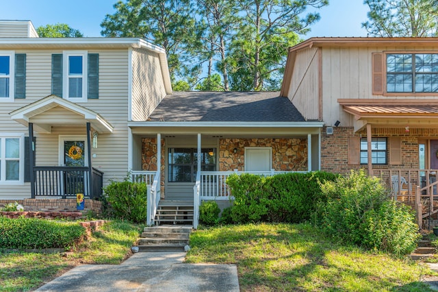 1207 Walter Ave, Crestview, FL 32536 - traditional-style house with a porch and roof with shingles