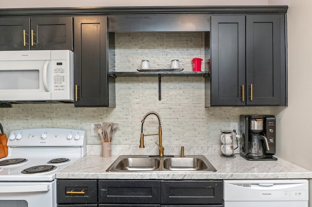 1207 Walter Ave, Crestview, FL 32536 - kitchen featuring white appliances, decorative backsplash, and light countertops