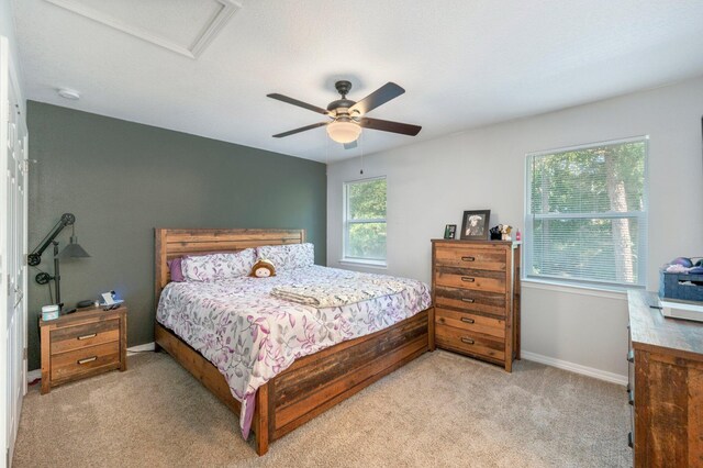 1207 Walter Ave, Crestview, FL 32536 - carpeted bedroom featuring attic access and ceiling fan