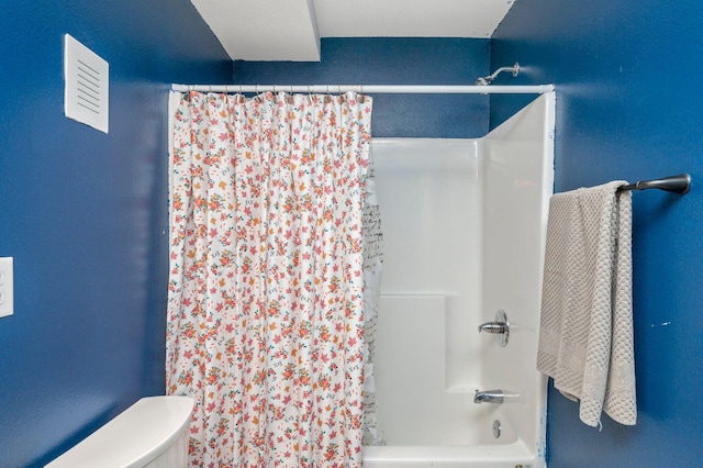 1207 Walter Ave, Crestview, FL 32536 - bathroom with shower / bath combination with curtain and toilet