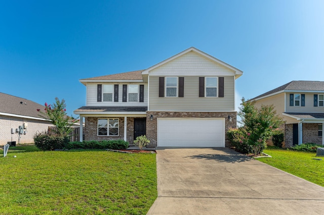 728 Widgeon Way, Crestview, FL 32539 - view of front of home with concrete driveway, an attached garage, a front lawn, and brick siding